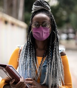 African student wearing a protective mask