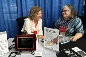 Sonya Bertini and Kathleen Fernandez at the advocacy table