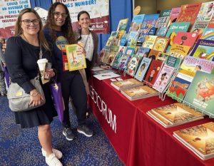 attendees browsing books