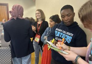 attendees getting information after a workshop