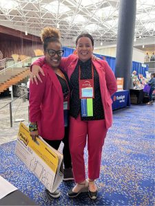 2 teachers wearing pink