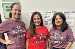 3 teachers with matching t-shirts