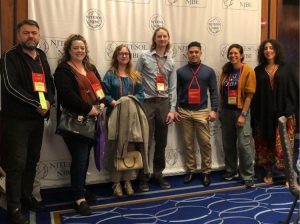 7 teachers in front of the selfie station